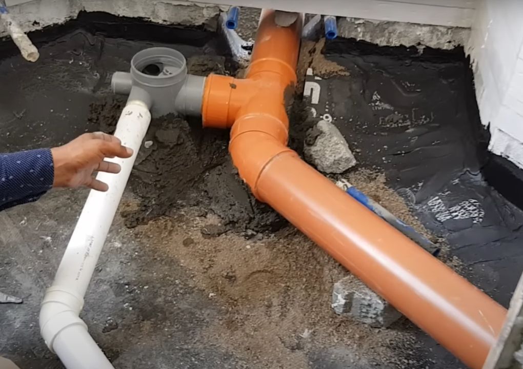 Should I get a plumber to install my drainage